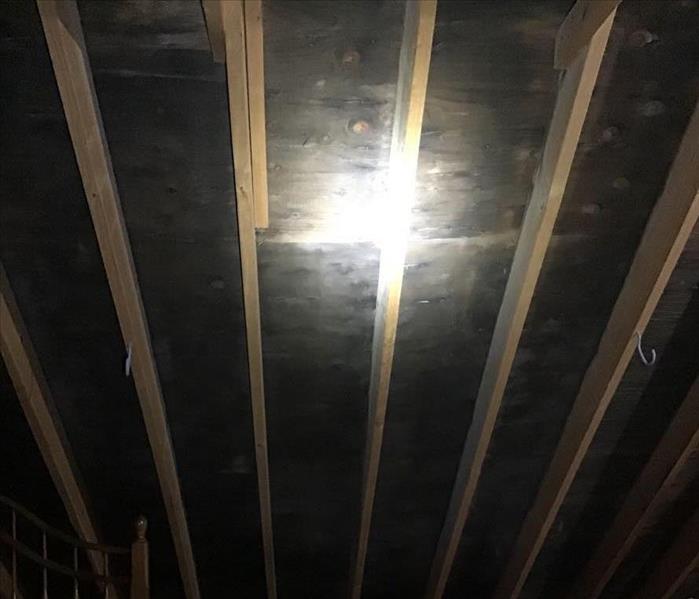 Attic walls before mold removal