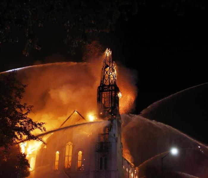Photo of First Baptist Church in Wakefield MA on fire after being struck by lightening in 2018