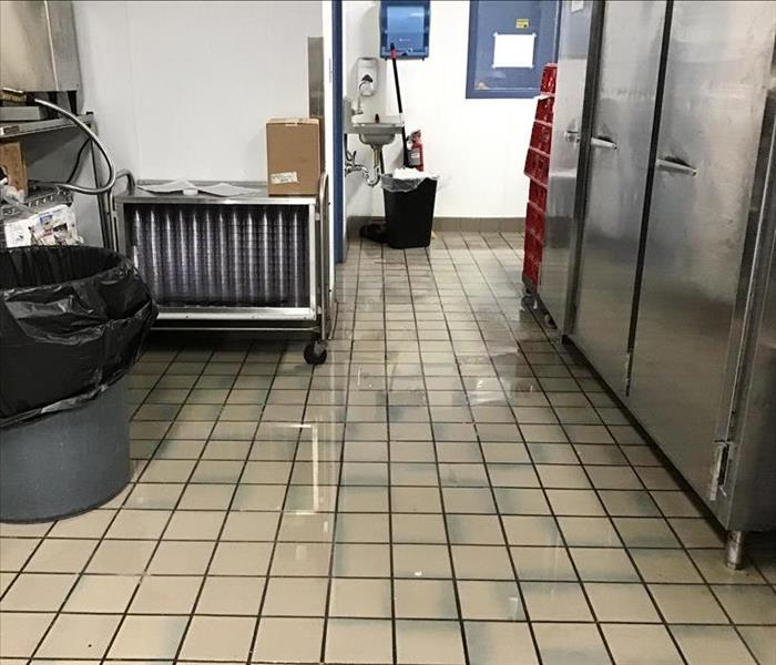 Photo of water damage in commercial kitchen.