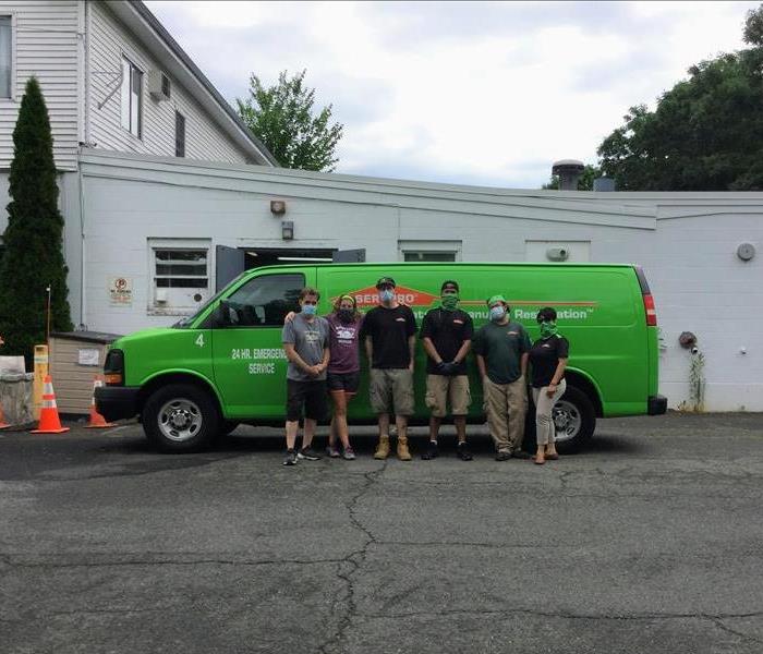 Photo of our crew with the team from Sweet Paws Rescue